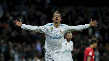 MADRID, SPAIN - FEBRUARY 10: Cristiano Ronaldo of Real Madrid CF celebrates scoring their fourth goal during the La Liga match between Real Madrid CF and Real Sociedad de Futbol at Estadio Santiago Bernabeu on February 10, 2018 in Madrid, Spain. (Photo by