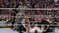 Snoop Dogg made a surprise entrance in the ring during Wrestlemania 39 on Sunday and knocked out The Miz.