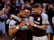 Soccer Football - Premier League - Aston Villa v Brighton & Hove Albion - Villa Park, Birmingham, Britain - February 11, 2026 Aston Villa's Tyrone Mings celebrates scoring their first goal with Morgan Rogers and Ross Barkley Action Images via Reuters/Andrew Couldridge EDITORIAL USE ONLY. NO USE WITH UNAUTHORIZED AUDIO, VIDEO, DATA, FIXTURE LISTS, CLUB/LEAGUE LOGOS OR 'LIVE' SERVICES. ONLINE IN-MATCH USE LIMITED TO 120 IMAGES, NO VIDEO EMULATION. NO USE IN BETTING, GAMES OR SINGLE CLUB/LEAGUE/PLAYER PUBLICATIONS. PLEASE CONTACT YOUR ACCOUNT REPRESENTATIVE FOR FURTHER DETAILS..