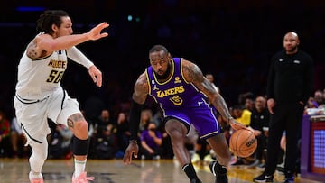 Dec 16, 2022; Los Angeles, California, USA; Los Angeles Lakers forward LeBron James (6) moves the ball against Denver Nuggets forward Aaron Gordon (50) during the second half at Crypto.com Arena. Mandatory Credit: Gary A. Vasquez-USA TODAY Sports