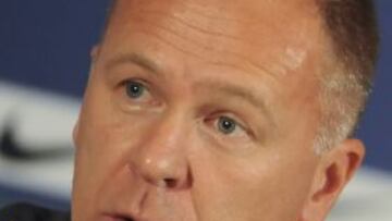 Brazilian national olympic football team coach Mano Menezes answers a question during a press conference prior to depart to dispute the 2012 London Olympic Games, in Rio de Janeiro, Brazil on July 16, 2012. AFP PHOTO/ANTONIO SCORZA