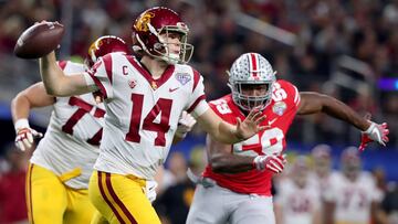 ARLINGTON, TX - DECEMBER 29: Sam Darnold #14 of the USC Trojans looks for an open receiver against Tyquan Lewis #59 of the Ohio State Buckeyes during the Goodyear Cotton Bowl Classic at AT&amp;T Stadium on December 29, 2017 in Arlington, Texas.   Tom Pennington/Getty Images/AFP
 == FOR NEWSPAPERS, INTERNET, TELCOS &amp; TELEVISION USE ONLY ==