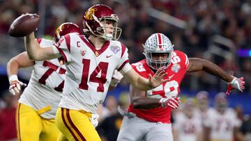 ARLINGTON, TX - DECEMBER 29: Sam Darnold #14 of the USC Trojans looks for an open receiver against Tyquan Lewis #59 of the Ohio State Buckeyes during the Goodyear Cotton Bowl Classic at AT&amp;T Stadium on December 29, 2017 in Arlington, Texas.   Tom Pennington/Getty Images/AFP
 == FOR NEWSPAPERS, INTERNET, TELCOS &amp; TELEVISION USE ONLY ==