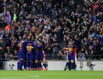 Leo Messi celebrates after scoring.