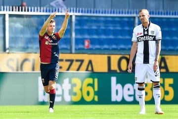 Genoa's Krzysztof Piatek celebrates scoring against Parma.
