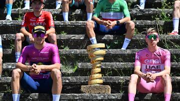 Pompei (Italy), 14/05/2024.- Slovenian rider Tadej Pogacar (R) of UAE Team Emirates in the overall leader's pink jersey and Jonathan Milan of team Lidl-Trek wearing the mauve jersey of the leader in the points classification, pose for photos next to the winner's trophy in the amphitheatre of Pompeii prior to the start of 10th stage of the Giro d'Italia 2024 cycling race over 142km from Pompei to Cusano Mutri, Italy, 14 May 2024. (Ciclismo, Italia, Eslovenia) EFE/EPA/ZEN