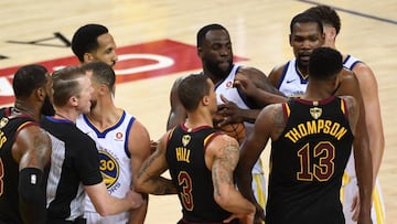 May 31, 2018; Oakland, CA, USA; Cleveland Cavaliers center Tristan Thompson (13) pushes Golden State Warriors forward Draymond Green (23) during overtime in game one of the 2018 NBA Finals at Oracle Arena. Mandatory Credit: Kyle Terada-USA TODAY Sports