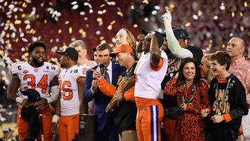 SANTA CLARA, CA - JANUARY 07: Head coach Dabo Swinney and Trayvon Mullen #1 of the Clemson Tigers celebrate their teams 44-16 win over the Alabama Crimson Tide with the trophy in the CFP National Championship presented by AT&amp;T at Levi&#039;s Stadium on January 7, 2019 in Santa Clara, California.   Harry How/Getty Images/AFP
 == FOR NEWSPAPERS, INTERNET, TELCOS &amp; TELEVISION USE ONLY ==
