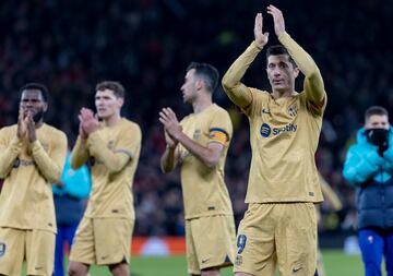 Barcelona took the lead at Old Trafford but two second-half goals saw Manchester United through. 