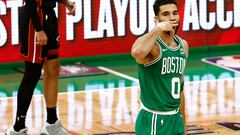 BOSTON, MA - APRIL 24: Jayson Tatum #0 of the Boston Celtics blows a kiss after making a three-point basket as Caleb Martin #16 of the Miami Heat walks away during the first quarter of game two of the Eastern Conference First Round Playoffs at TD Garden on April 24, 2024 in Boston, Massachusetts. NOTE TO USER: User expressly acknowledges and agrees that, by downloading and/or using this Photograph, user is consenting to the terms and conditions of the Getty Images License Agreement. (Photo By Winslow Townson/Getty Images) (Photo by Winslow Townson / GETTY IMAGES NORTH AMERICA / Getty Images via AFP)