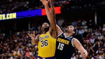 Los Angeles falls again to title contender Denver as LeBron James passes Kareem Abdul-Jabbar for most field goals in NBA history.