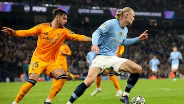Asencio y Haaland, durante el City-Real Madrid.