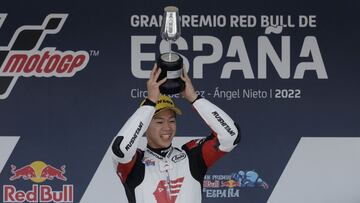 MotoGP - Spanish Grand Prix - Circuito de Jerez, Jerez, Spain - May 1, 2022 Idemitsu Honda Team Asia's Ai Ogura celebrates with a trophy on the podium after winning the Moto2 race REUTERS/Jon Nazca