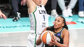 New York Liberty forward Betnijah Laney-Hamilton (44) drives past Minnesota Lynx forward Cecilia Zandalasini (9) in the second quarter at Barclays Center.