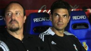 Pellegrino y Benítez en el banquillo del Liverpool.
