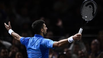 Serbia's Novak Djokovic celebrates after winning a point in a tiebreak game of his men's singles semi-final match against Andrey Rublev on day six of the Paris ATP Masters 1000 tennis tournament at the Accor Arena - Palais Omnisports de Paris-Bercy - in Paris on November 4, 2023. (Photo by JULIEN DE ROSA / AFP)