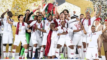 ABU DHABI, UNITED ARAB EMIRATES - FEBRUARY 01: Players of Qatar celebrate their victory with the trophy after the AFC Asian Cup final match between Japan and Qatar at Zayed Sports City Stadium on February 01, 2019 in Abu Dhabi, United Arab Emirates. (Phot