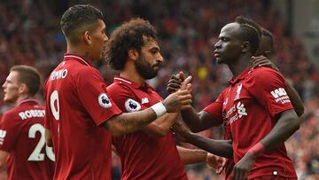 Los jugadores del Liverpool celebran un gol.