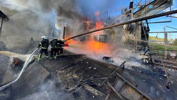 Firefighters work at a site of an infrastructure object damaged by a Russian missile strike, amid Russia's attack on Ukraine, in Kyiv, Ukraine October 10, 2022. Press service of the State Emergency Service of Ukraine/Handout via REUTERS ATTENTION EDITORS - THIS IMAGE HAS BEEN SUPPLIED BY A THIRD PARTY.