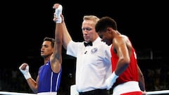 Cuban pummels Mayweather protégé to take gold