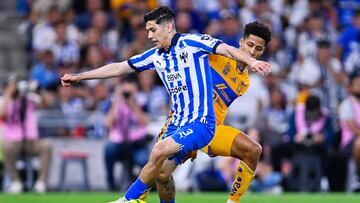 Gerardo Arteaga (R) of Monterrey fights for the ball with Jonathan Herrera (R) of Tigres during the 15th round match between Monterrey an Tigres UANL as part of the Torneo Clausura 2024 Liga BBVA MX at BBVA Bancomer Stadium on April 13, 2024 in Monterrey, Nuevo Leon, Mexico.