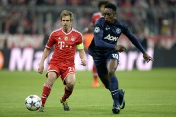 Philipp Lahm y Danny Welbeck.