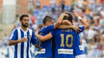 Los jugadores del Recreativo celebran un gol.