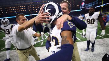 DETROIT, MI - DECEMBER 02: Troy Hill #32 of the Los Angeles Rams celebrates on the sidelines after intercepting a Detroit Lions pass at the end of the fourth quarter in the Rams 30-16 victory over the Lions at Ford Field on December 2, 2018 in Detroit, Mi