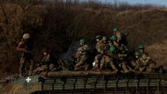 Soldiers from Carpathian Sich international battalion conduct manoeuvres near the front line, as Russia's attack on Ukraine continues, near Kreminna, Ukraine, January 3, 2023. REUTERS/Clodagh Kilcoyne REFILE - CORRECTING LOCATION