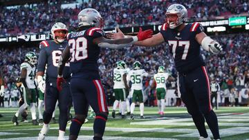 FOXBOROUGH, MASSACHUSETTS - OCTOBER 27: Ben Brown #77 and Rhamondre Stevenson #38 of the New England Patriots react during the fourth quarter against the New York Jets at Gillette Stadium on October 27, 2024 in Foxborough, Massachusetts.   Adam Glanzman/Getty Images/AFP (Photo by Adam Glanzman / GETTY IMAGES NORTH AMERICA / Getty Images via AFP)