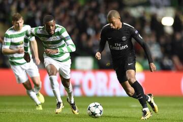 PSG's Kylian Mbappe runs away from Celtic's midfielder Olivier Ntcham