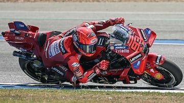 Ducati Lenovo's Spanish rider Marc Marquez rides during the qualifying session of the MotoGP Thailand Grand Prix at the Buriram International Circuit in Buriram on March 1, 2025. (Photo by Lillian SUWANRUMPHA / AFP)