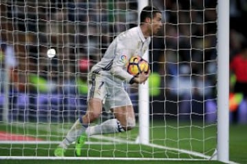 MADRID, SPAIN - MARCH 01:  Cristiano Ronaldo of Real Madrid CF picks the ball after scoring their second goal during the La Liga match between Real Madrid CF and UD Las Palmas at Estadio Santiago Bernabeu on March 1, 2017 in Madrid, Spain.  (Photo by Gonz