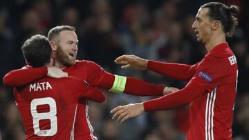 Manchester United&#039;s Juan Mata celebrates scoring their second goal  with Wayne Rooney and Zlatan Ibrahimovic.