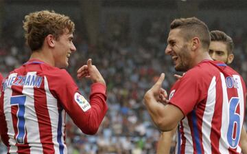 Koke y Antoine Griezmann.