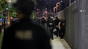 Police officers detain people during a protest against federal immigration sweeps, in Los Angeles, California, U.S., June 12, 2025. REUTERS/Leah Millis