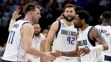 DALLAS, TEXAS - MARCH 07: Kyrie Irving #2 of the Dallas Mavericks celebrates with Luka Doncic #77 of the Dallas Mavericks after scoring against the Utah Jazz in the fourth quarter at American Airlines Center on March 07, 2023 in Dallas, Texas. Tom Pennington/Getty Images/AFP (Photo by TOM PENNINGTON / GETTY IMAGES NORTH AMERICA / Getty Images via AFP)