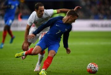 Antoine Griezmann y Roman Shirokov.