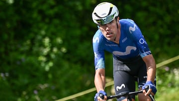 (FILES) Movistar Team's Basque rider Oier Lazkano cycles in a breakaway in the ascent of Pas de Peyrol (Puy Mary) during the 11th stage of the 111th edition of the Tour de France cycling race, 211 km between �vaux-les-Bains and Le Lioran, in the Massif Central mountains of central France, on July 10, 2024. Spanish cyclist Oier Lazkano has been provisionally suspended by the International Cycling Union (UCI) due to 'unexplained anomalies in his biological athlete passport in 2022, 2023 and 2024', the governing body announced on October 30, 2025. (Photo by Marco BERTORELLO / AFP)