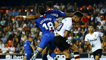 Escudero  of Sevilla FC and Ferran Torres of Valencia CF    during La Liga match between Valencia CF vs Sevilla FC at Mestalla  Stadium on October 30, 2019.