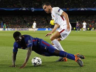 Samuel Umtiti con Kevin Strootman.