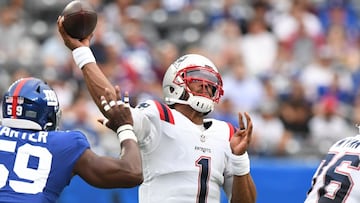 Aug 29, 2021; East Rutherford, New Jersey, USA; New England Patriots quarterback Cam Newton (1) attempts pass against the New York Giants at MetLife Stadium. Mandatory Credit: Dennis Schneidler-USA TODAY Sports