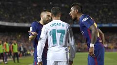 BARCELONA, SPAIN - MAY 06: Lucas Vazquez of Real Madrid is confronted by Jordi Alba of Barcelona and Paulinho of Barcelona during the La Liga match between Barcelona and Real Madrid at Camp Nou on May 6, 2018 in Barcelona, Spain.  (Photo by Alex Caparros/