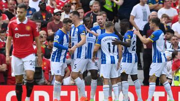 Soccer Football - Premier League - Manchester United v Brighton & Hove Albion - Old Trafford, Manchester, Britain - August 7, 2022 Brighton & Hove Albion's Pascal Gross celebrates scoring their first goal with Lewis Dunk, Danny Welbeck and teammates REUTERS/Toby Melville EDITORIAL USE ONLY. No use with unauthorized audio, video, data, fixture lists, club/league logos or 'live' services. Online in-match use limited to 75 images, no video emulation. No use in betting, games or single club /league/player publications. Please contact your account representative for further details.