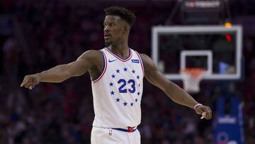 (FILES) In this file photo taken on May 9, 2019 Jimmy Butler #23 of the Philadelphia 76ers points against the Toronto Raptors in Game Six of the Eastern Conference Semifinals at the Wells Fargo Center in Philadelphia, Pennsylvania. - NBA scoring champion James Harden and playmaker Chris Paul would have Philadelphia star Jimmy Butler as a new teammate if the Houston Rockets get their way, ESPN reported on June 26, 2019. Unnamed league sources told the US-based telecaster that the Rockets want Butler to push the 76ers for a sign-and-trade deal that would let the All-Star forward move to Houston. (Photo by Mitchell Leff / GETTY IMAGES NORTH AMERICA / AFP)