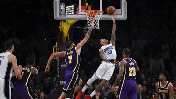 Jan 15, 2020; Los Angeles, California, USA; Orlando Magic guard Markelle Fultz (20) shoot a layup past Los Angeles Lakers center JaVale McGee (7) during the second half at Staples Center. Mandatory Credit: Kelvin Kuo-USA TODAY Sports