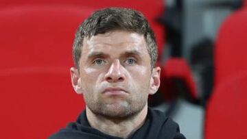 Germany's forward Thomas Muller stands for national anthems ahead of a friendly football match between Oman and Germany at the Sultan Qaboos Sports Complex stadium in Muscat on November 16, 2022. (Photo by Haitham AL-SHUKAIRI / AFP) (Photo by HAITHAM AL-SHUKAIRI/AFP via Getty Images)