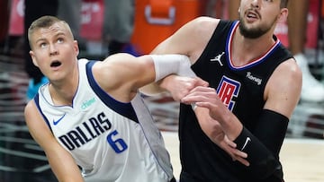 May 25, 2021; Los Angeles, California, USA; Dallas Mavericks center Kristaps Porzingis (6) and LA Clippers center Ivica Zubac (40) jockey for rebounding position during the first quarter of game two in the first round of the 2021 NBA Playoffs. at Staples Center. Mandatory Credit: Robert Hanashiro-USA TODAY Sports