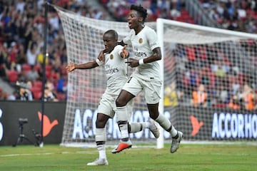 Moussa Diaby and Timothy Weah celebrate in today's International Champions Cup match against Atlético de Madrid.