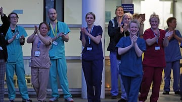 NHS workers applaud outside the Royal Liverpool University Hospital.